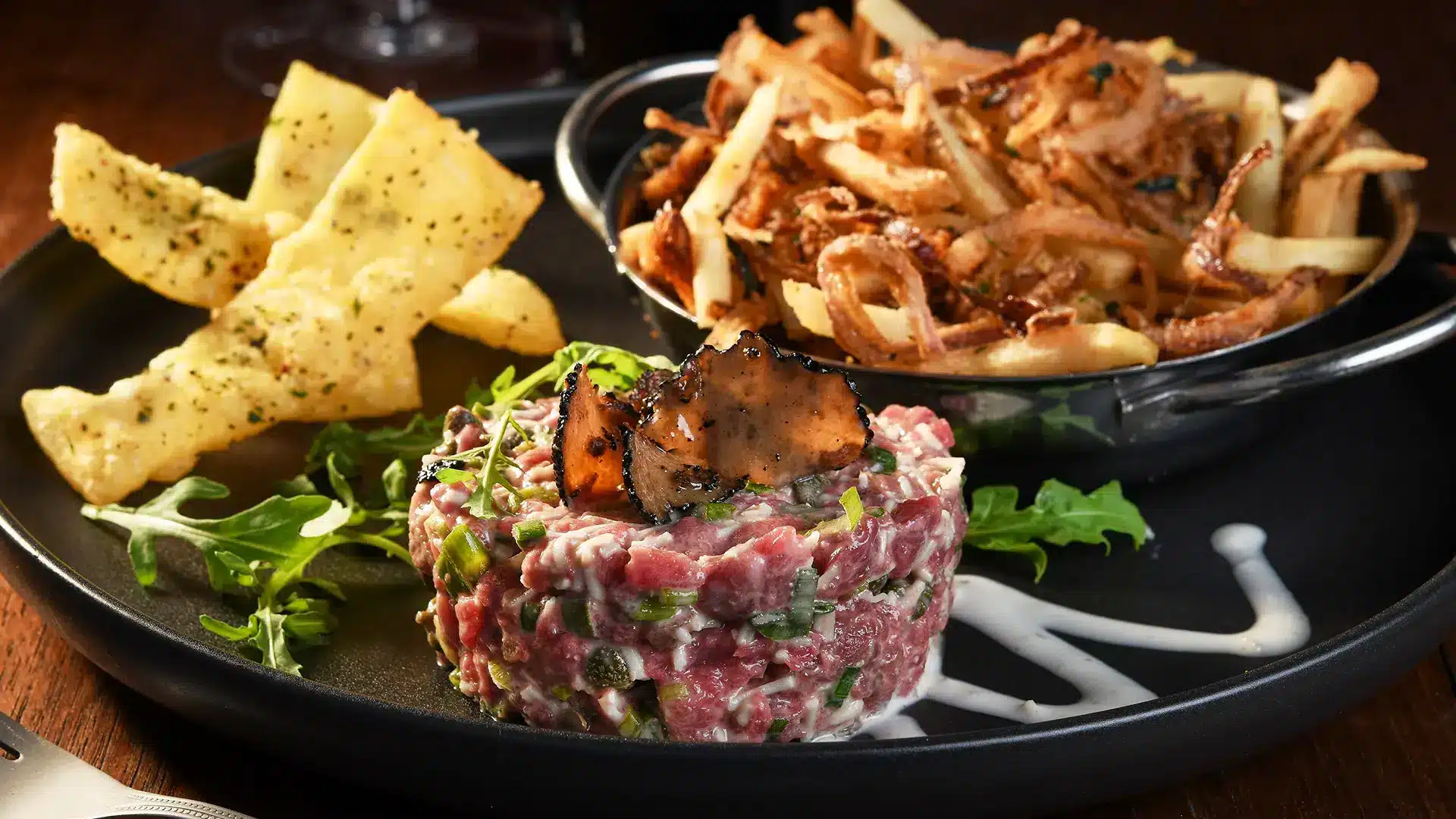 Tartare topped with truffles served at PACINI restaurant